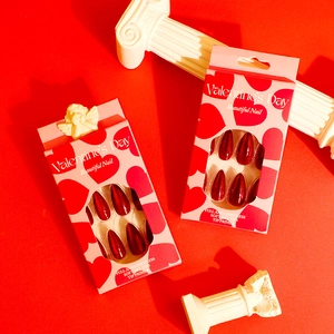 Red glitter soft gel press-on nails set for Valentine's Day with almond shape design