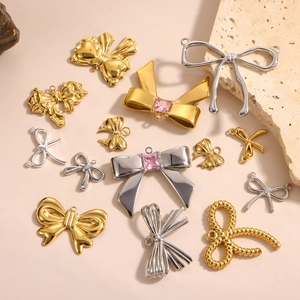 Polished gold and silver bow pendants with pink zircon for DIY necklace jewelry making