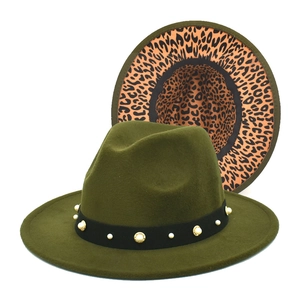 Detail of olive green fedora with pearl studs and leopard print underbrim accent