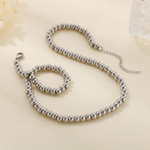 Détails de l'ensemble de bijoux avec collier et bracelet en perles d'acier argenté