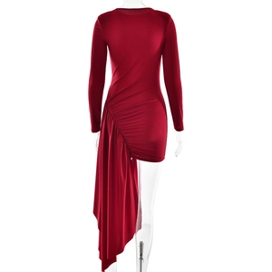 Detailed back view of a slim-fit red ruched dress with asymmetrical draped hemline