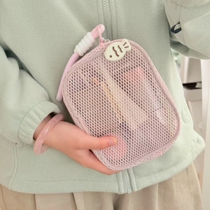 Pink mesh makeup bag with pearl zipper and top handle for travel organization