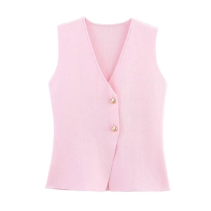 Close-up of pink V-neck knit vest featuring textured fabric and polished gold buttons