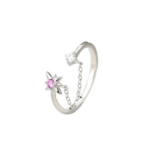 Anillo de cadena en plata S925 con estrella rosa y circón claro en fondo blanco