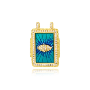 Detail of gold tarot charm with turquoise enamel evil eye and sparkling crystals