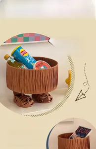 Creative foot-shaped woven storage basket showing woven texture and sandal base detail