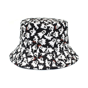 Close-up of Halloween bucket hat with white ghost patterns on black fabric