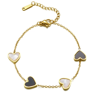Titanium steel bracelet with black and white heart charms on a white background