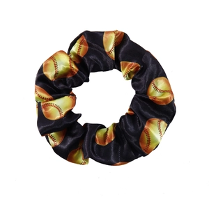 Black satin hair scrunchie with yellow softball print shown on a plain white background