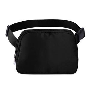 Minimalist black athletic fanny pack with adjustable strap and waterproof nylon fabric