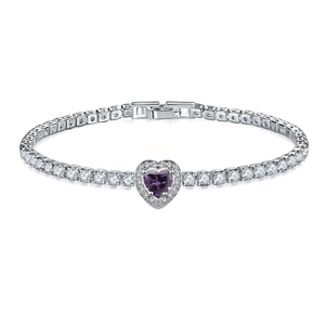 Detail of a silver tennis bracelet featuring a heart-shaped purple stone and round zircons