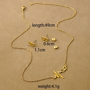 Macro shot of gold heartbeat necklace and stud earrings set with dimension specifications