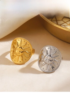Detailed relief of sun face and stars on gold and silver stainless steel rings