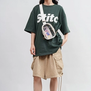 Transparent candy-colored PVC crossbody bag with beige strap and minimalist beach jelly style