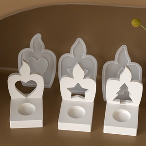 Silicone candle holder molds featuring hollow heart star and Christmas tree shapes