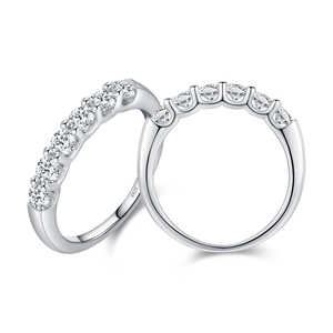 Elegant S925 sterling silver eternity rings with sparkling moissanite stones on white background