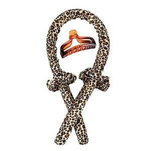 Leopard print heatless hair curler set with satin roller, two scrunchies, and amber claw clip