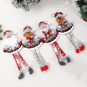 Set of 4 Christmas plush ornaments with long legs and Feliz Navidad signs