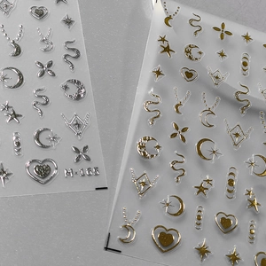 Stereoscopic 3D gold and silver nail art stickers with moon, star and heart patterns