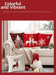 Close-up of festive Christmas pillow covers with reindeer and snowflake prints on a sofa