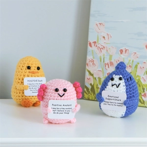 Handmade crochet positive duck, axolotl, and shark plush toys with encouragement cards
