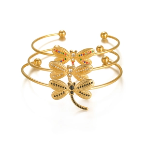 Three-piece set of golden dragonfly open bangles with colorful rhinestones on white base
