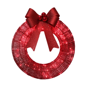 Detail of red Christmas wreath with lighted LED mesh and sparkling glitter bow decoration