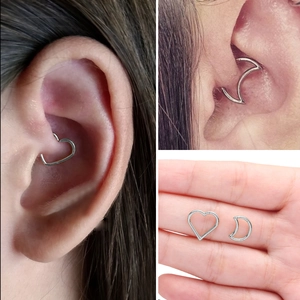 Detailed views of 316L stainless steel heart and moon seamless cartilage piercing hoops
