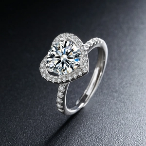 Elegant heart shaped ring with sparkling halo moissanite stones and pavé silver band
