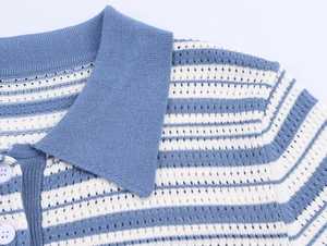 Detail of a blue and white striped knit shirt showing the collar and buttoned neckline