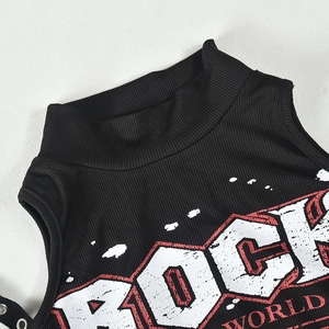 Detail of black ribbed knit dress with chic mock neck and vintage ROCK WORLD print