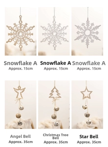 Detail of Christmas snowflake ornaments and bell pendants in a grid display set
