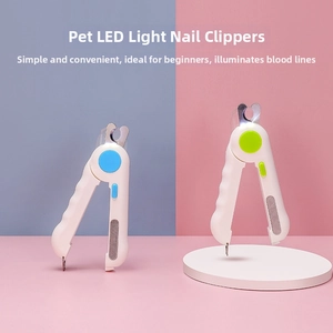 Detail showing the ergonomic anti-slip handle and LED light on the pet nail clippers