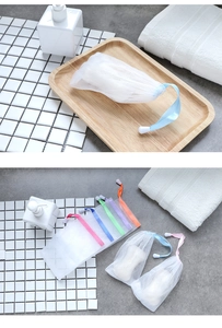 Detail of double-layer foaming net bag with colorful drawstrings for soap storage
