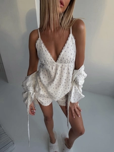 Floral three-piece loungewear set with V-neck camisole, shorts and long sleeve cardigan