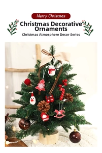 Detail of felt snowman and reindeer ornaments with pine cones on a Christmas tree