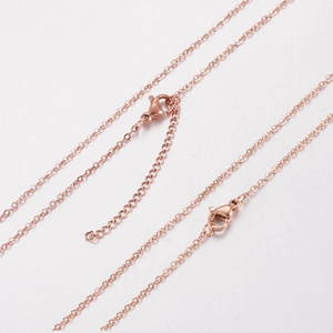 Rose gold plated stainless steel cross chain necklace with lobster clasp and extender