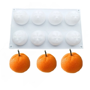 Detail of 8-cavity orange silicone mold for DIY mousse cakes and realistic fruit desserts