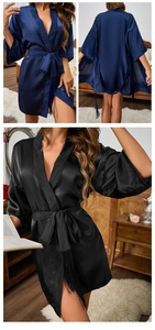 Detail of silk-like satin kimono robe featuring a V-neck and stylish waist tie with tassels