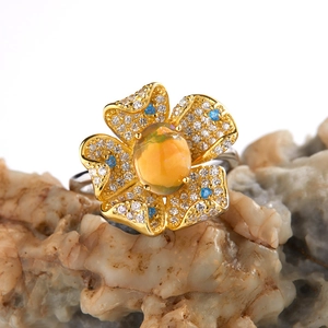 Floral S925 sterling silver ring with oval opal center and cubic zirconia petals