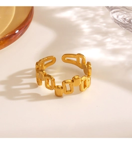 Detail of 18K gold plated stainless steel ring with geometric chain design and matte texture