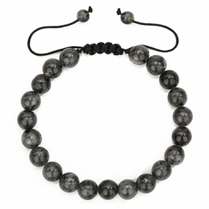 Macro detail of 8mm grey labradorite beads with black adjustable braided rope on bracelet