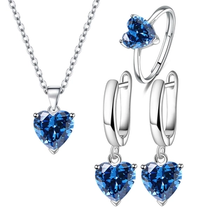 Elegant silver jewelry set with heart-shaped blue zircon necklace, ring and earrings