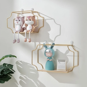 Modern gold iron wall shelves with wooden base and nordic minimalist home decor style