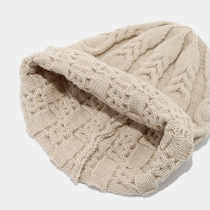 Beige chunky cable knit beanie hat with turn-up cuff for autumn and winter warmth