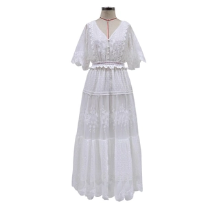 Elegant white V-neck short sleeve lace maxi dress with floral embroidery and tiered skirt