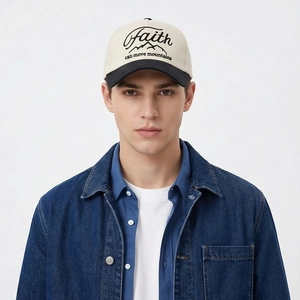 Detail of Faith can move mountains embroidery on two-tone cotton baseball cap