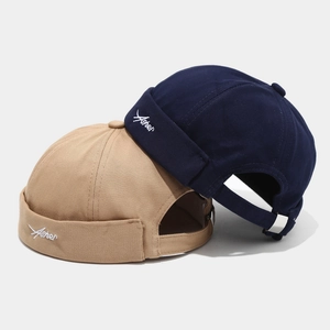 Navy and khaki cotton Miki hats with letter embroidery and adjustable metal buckle