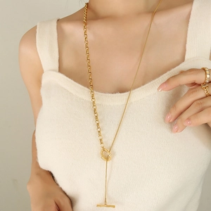 Golden dual-texture chain necklace with OT clasp toggle on model for women