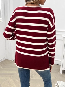 Detail view of the striped knit sweater back with red and white horizontal patterns